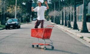 Man on shopping cart